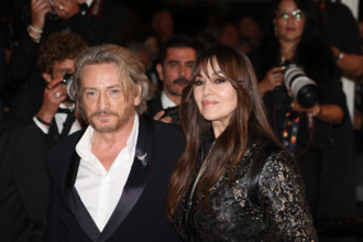 Benoit Magimel and Monica Bellucci (in Fendi) attends the "Histoires De La Nuit" (The Birthday