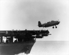 Catapult launch of a torpedo plane by an American aircraft carrier, 1944-45