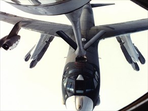 Mid-air refueling of a Boeing B-52 heavy bomber