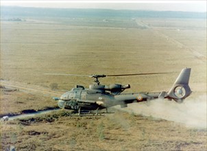 French Aérospatiale SA-342 Gazelle helicopter firing a missile