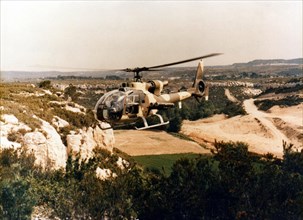 French Aérospatiale SA-342 Gazelle helicopter equipped with missiles.