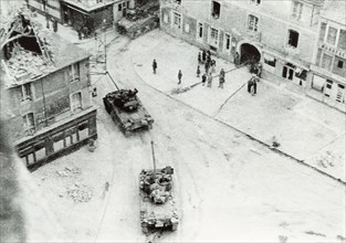American tanks entering the village of Douvres la Délivrande