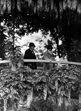 Painter Claude Monet and Clemenceau on the waterlilies bridge, at Giverny