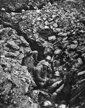 Soldiers in a trench waiting for a counter-attack, August 1917