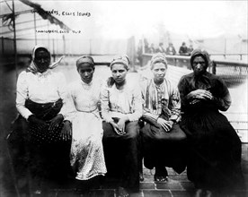 Photograph by Geo. G. Bain. Immigrants at Ellis Island