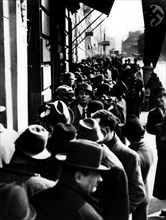 Vienna. Jews stand in line, waiting to obtain a visa for Poland
