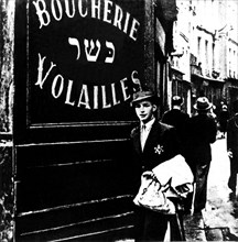 In Paris, a young Jewish man proudly wearing his yellow star