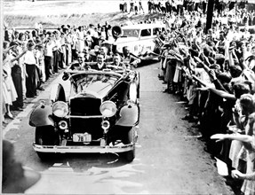 Franklin Delano Roosevelt in Atlanta during the election campaign (his son is sitting in front of the car)