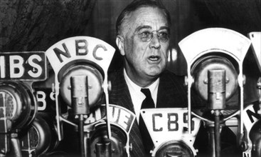 Roosevelt delivering a speech on the radio