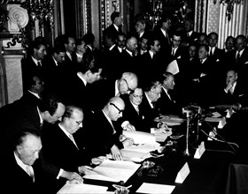 Robert Schuman signing the treaty for the European community Defense