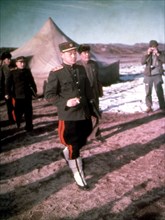 General Namii, North Korean delegate, in the foreground, and General Pien Chang Wu leaving the Panmunjom conference, 1951