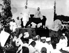 Gandhi surrounded by his partisans