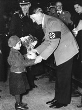 Hitler receiving flowers