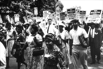 Marche sur Washington qui a rassemblé 200 000 noirs et blancs et au cours de laquelle le président Kennedy a annoncé un programme pour les droits civiques