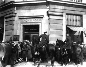 New York. The mounted police dispersing a demonstration of unemployed workers at Union square