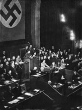 Hitler delivering a speech at the Reichstag, 1st anniversary of the National Socialist victory