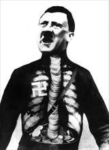 Photomontage by John Heartfield: "Adolf the superman swallows gold and spouts junk" (1932)