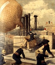 A hot-air balloon on the roofs