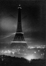 Illuminated Eiffel Tower in the night of July 14, 1919