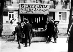 Ham fair in Paris: Stand selling American sausages