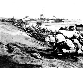 The Pacific War: American Marines from the 4th division landing on the beach of the volcanic island of Iwo-Jima