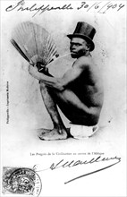 Racist postcard. "Advancements in Central Africa's civilization"