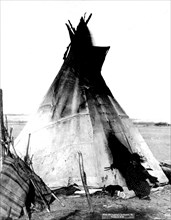 An Indian in his tepee