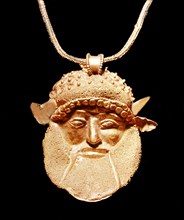 Golden Etruscan pendant representing Achelous