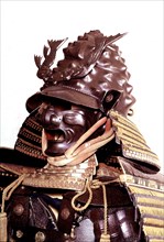 Travail de Myochin Muneakira, célèbre pour la beauté de son armure ciselée