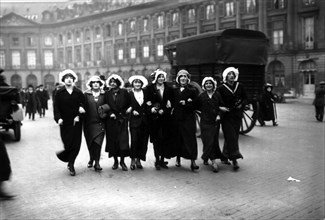 'Catherinettes' on the street (25-year-old-women still unmarried by the Feast of St. Catherine), 1913