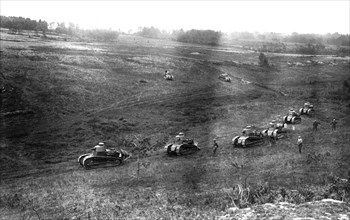 Army manoeuvres. Tanks advancing in the valley (1922)