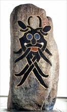 Pierre runique avec représentation d'un dieu et inscription, vers 800-900