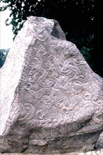 Runic stone, with a carved dragon, intended for ancestor worship (Denmark, 983)