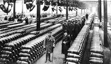 World War I. King George V visiting a shell factory (1917)