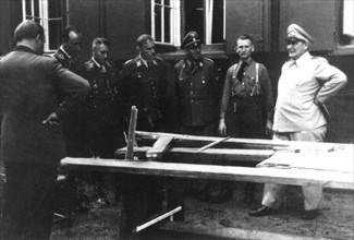 Hitler: assassination attempt, July 20, 1944. Göering, Schaub (3rd on the r.), Koller (3rd on the l.) and Fegelein