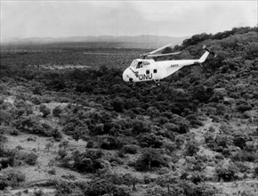Katanga. A U.N.O. helicopter provides U.N.O. forces with supplies in the North of the country.