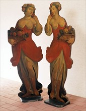 Two silhouetted female figures