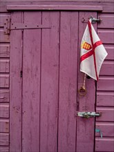 Wooden door with the flag of Jersey