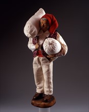 Christmas figure from Provence: miller carrying sacks of wheat