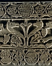 Animals facing each other around the tree of life (detail)