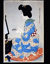 Shinsui, Jeune femme assise devant son miroir pour appliquer du rouge sur ses lèvres
