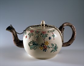 Teapot with polychrome floral design
