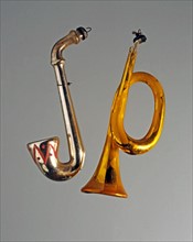 Christmas baubles in the shape of a saxaphone and a trumpet