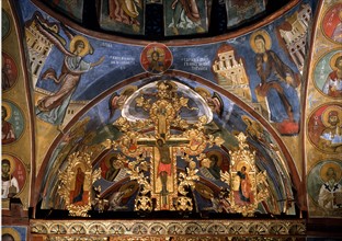 Superior part of the iconostasis with gilt wood crucifix