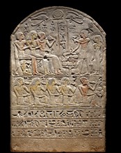 Stele for the late Tato depicting funeral banquet and servants