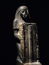 Dark grey granite statue of the high priest Ptamose