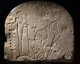 Petit stèle votif gravé d'un scène de victoire dédié au Pharaon Mérenptah