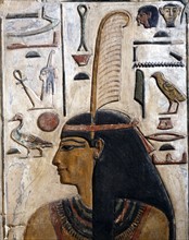 Detail of painted stucco relief depicting the goddess Maat
