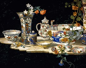 Table top in marquetry of hard stones decorated with a composition of porcelain and flower vases