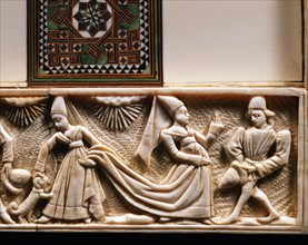 Ivory chessboard, ebony wood and iron. Detail. Chivalrous meeting. Noble lady with servant and little dog.